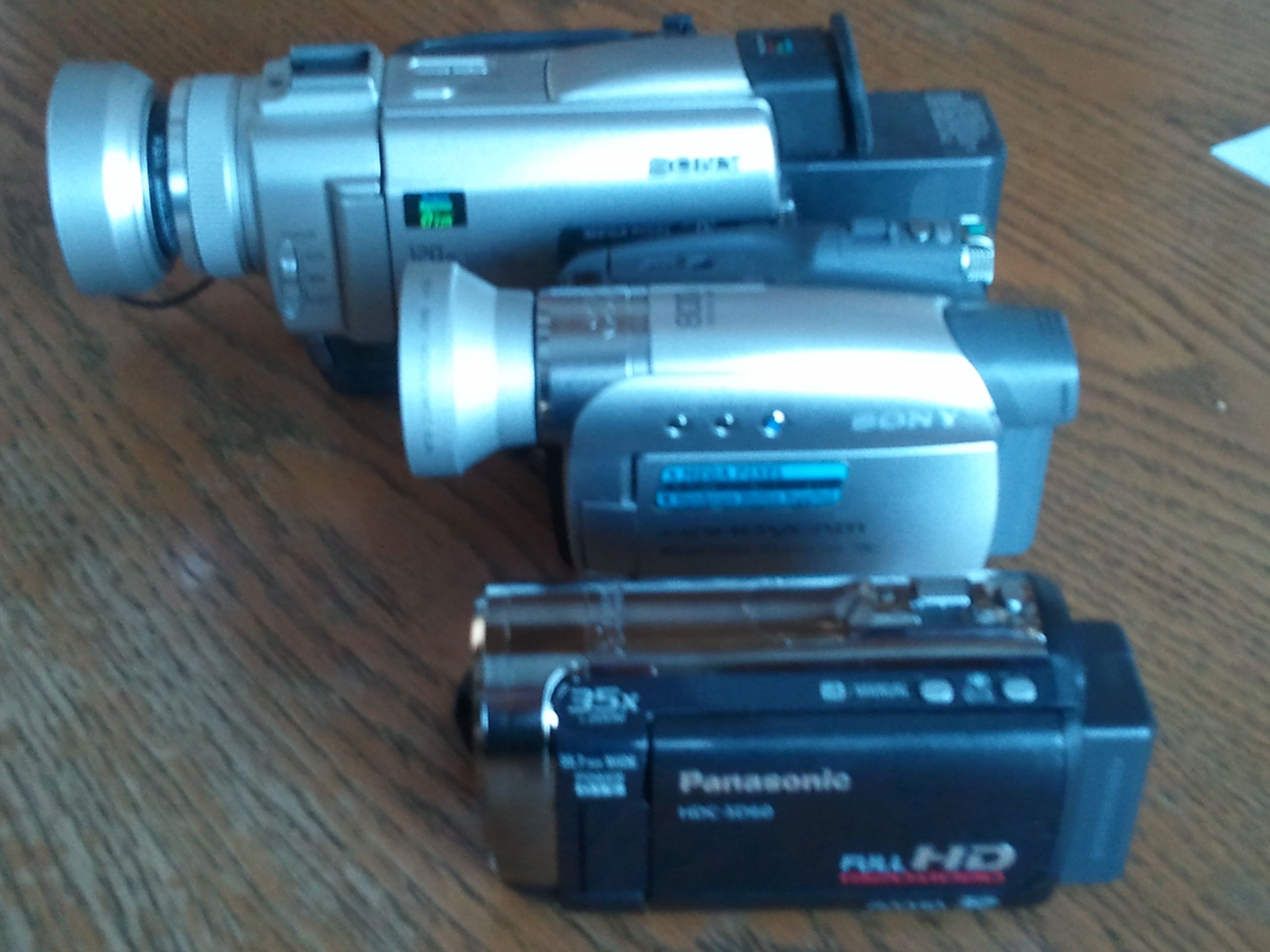 Photo of three of my old camcorders